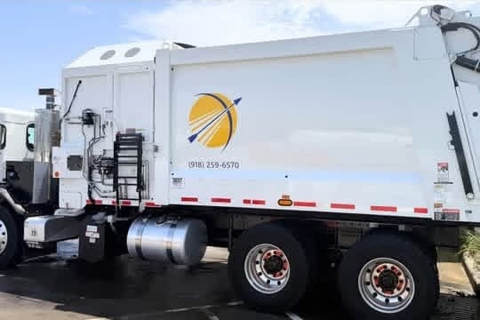 The same truck wheels after cleaning, showing bright aluminium rims, clean hubs and orange lug nut indicators